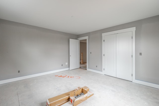 unfurnished bedroom with a closet