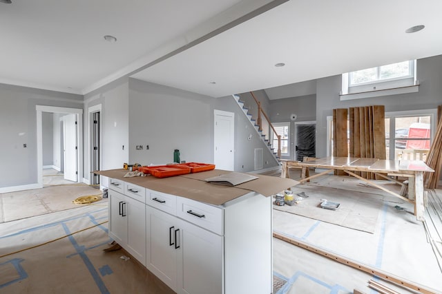 kitchen featuring white cabinetry and a center island