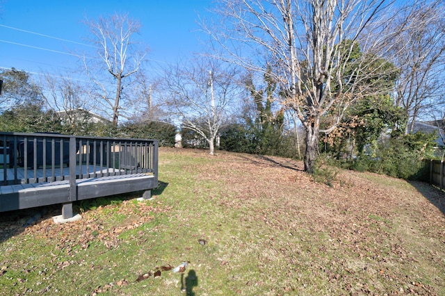 view of yard featuring a wooden deck