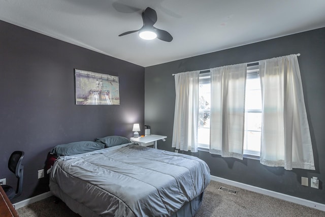 bedroom featuring ceiling fan and carpet floors