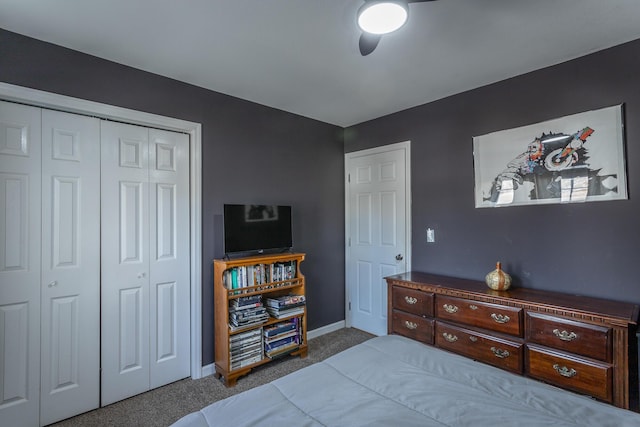 bedroom featuring carpet flooring, ceiling fan, and a closet