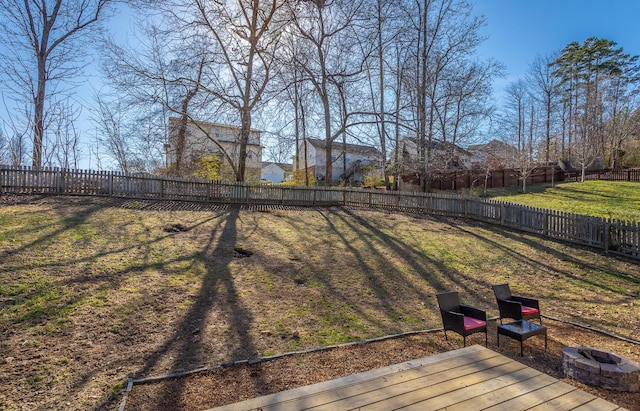 view of yard with a wooden deck