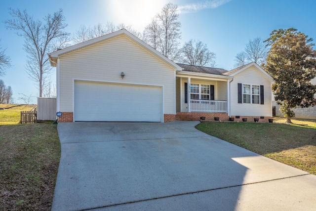 single story home featuring a porch, a garage, and a front lawn