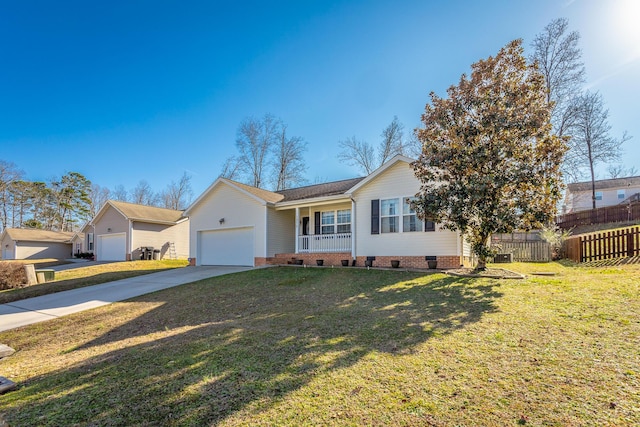 ranch-style house with a garage, covered porch, and a front yard