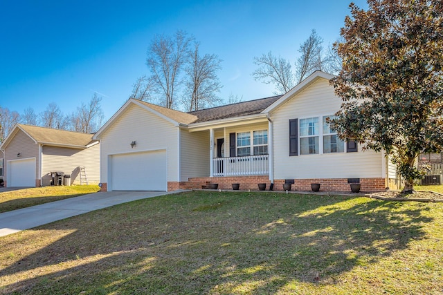 ranch-style house with a porch, a garage, and a front lawn