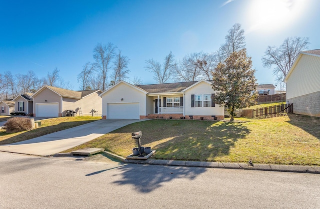 single story home with a garage and a front yard