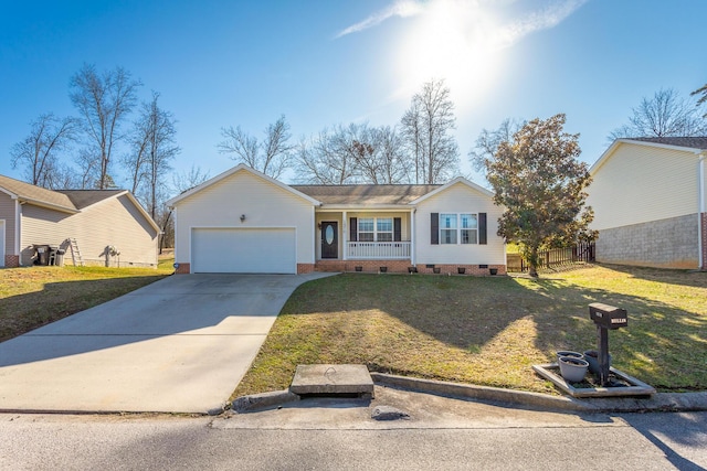 ranch-style house featuring a garage, covered porch, and a front lawn