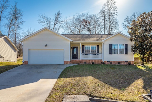 ranch-style house featuring a porch, a garage, and a front lawn