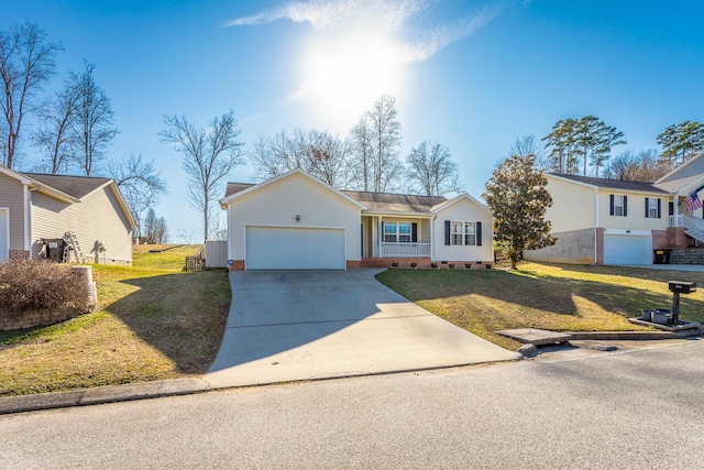 single story home with a garage and a front yard