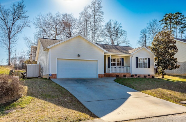 ranch-style house with a garage, covered porch, and a front yard