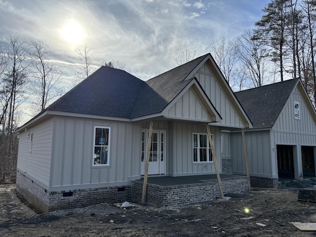 view of front of property featuring covered porch