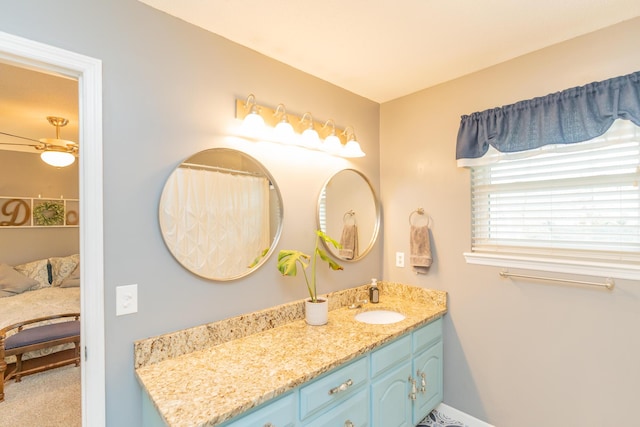 bathroom with vanity and ceiling fan