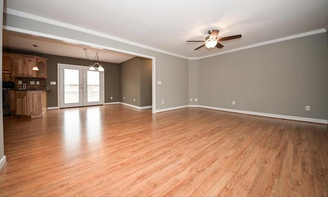 unfurnished living room with light hardwood / wood-style flooring, ornamental molding, french doors, and ceiling fan