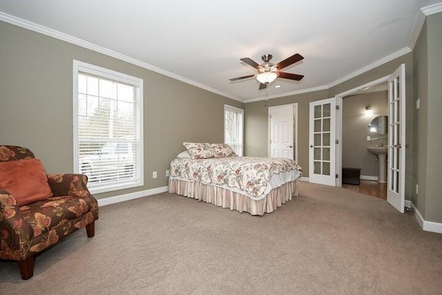 carpeted bedroom with ornamental molding, french doors, and ceiling fan