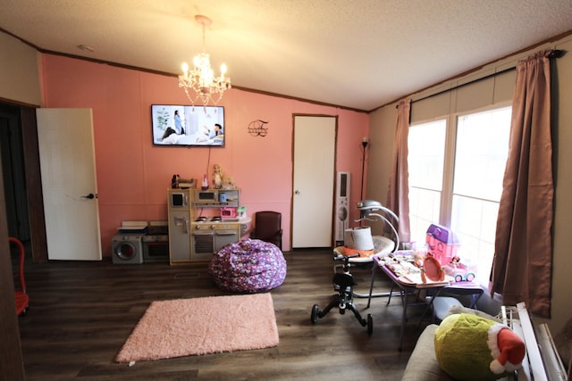 interior space with dark wood-type flooring, ornamental molding, a textured ceiling, and plenty of natural light