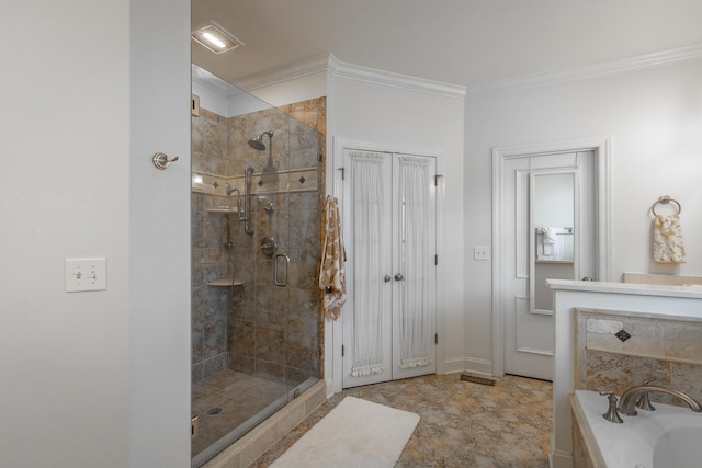 bathroom with crown molding and shower with separate bathtub