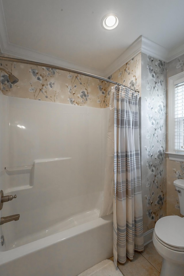 bathroom featuring shower / bath combination with curtain, crown molding, tile patterned flooring, and toilet