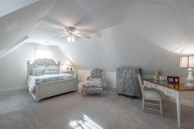 carpeted bedroom with ceiling fan and lofted ceiling