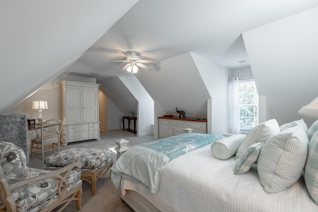 carpeted bedroom featuring ceiling fan and lofted ceiling