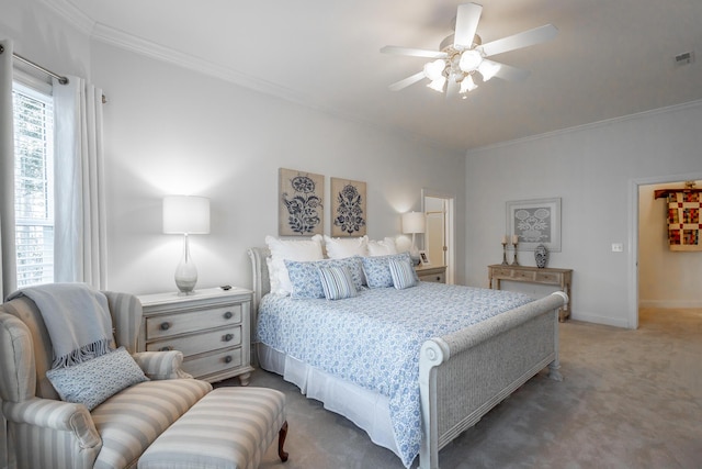 carpeted bedroom featuring ornamental molding and ceiling fan