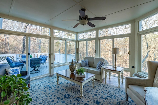 sunroom / solarium with ceiling fan