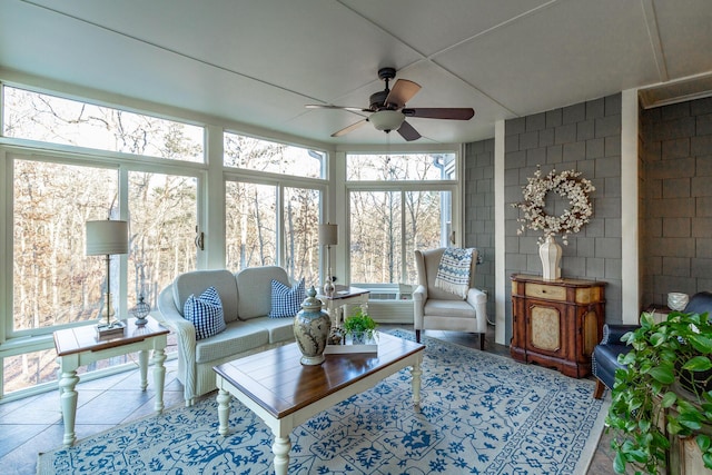 sunroom / solarium with ceiling fan