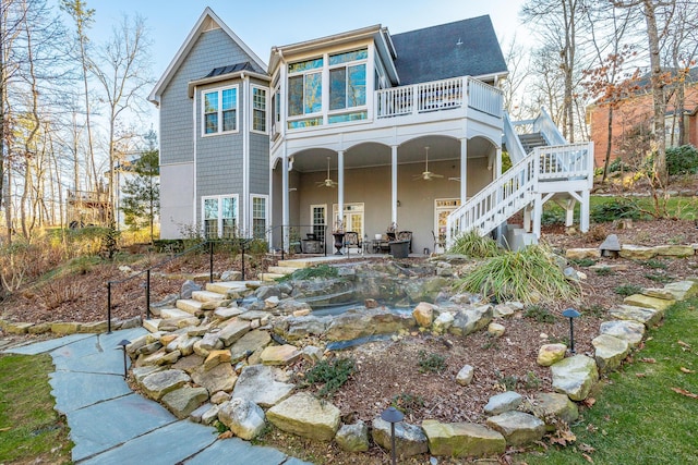 back of property with a patio and ceiling fan