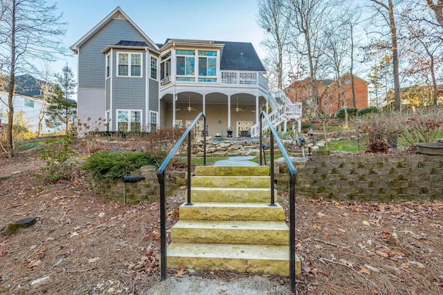 view of front of property with a sunroom