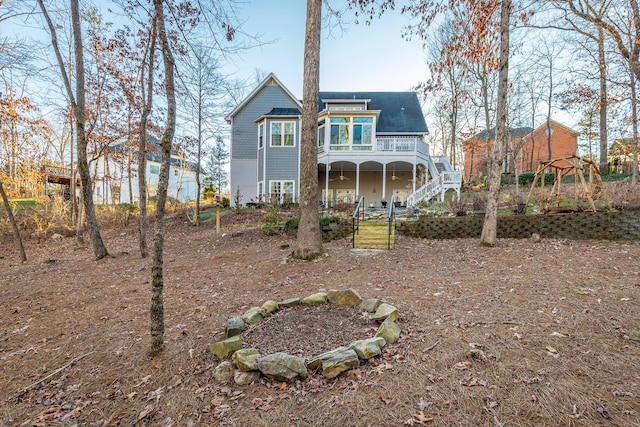 rear view of house with a sunroom