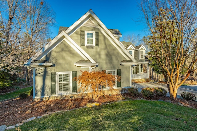 view of home's exterior featuring a yard