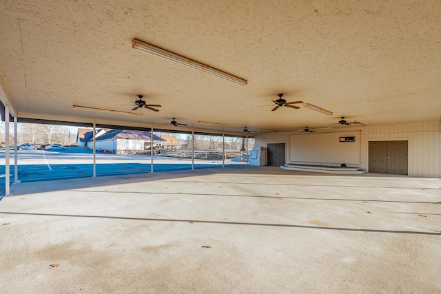 view of patio featuring ceiling fan