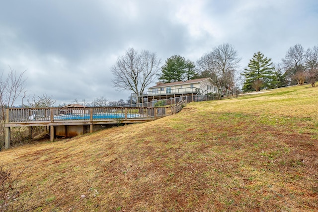 view of yard with a wooden deck