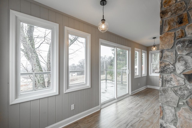 entryway with hardwood / wood-style flooring