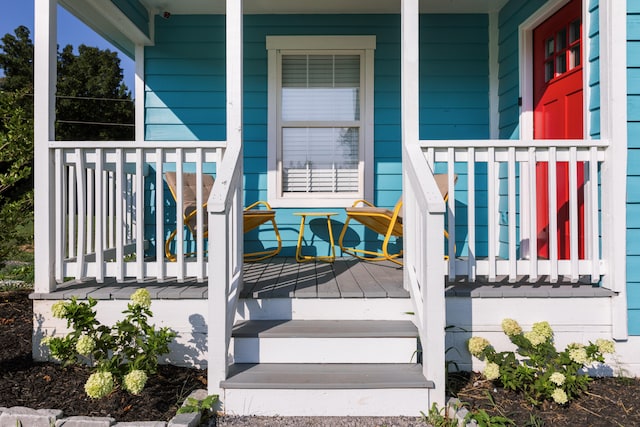 entrance to property with covered porch