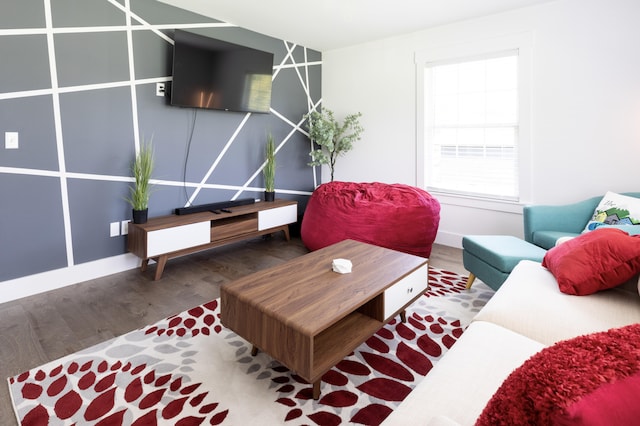 living room with dark hardwood / wood-style flooring