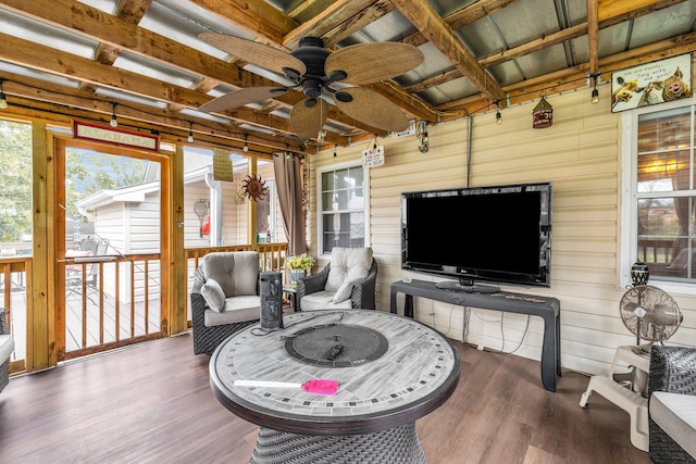 sunroom / solarium with ceiling fan