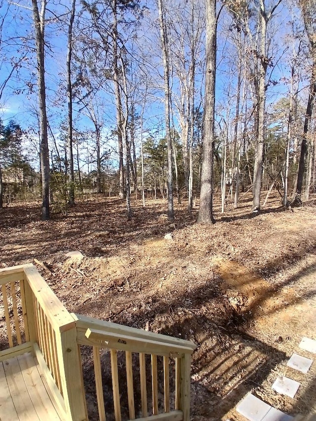 view of yard with a wooden deck