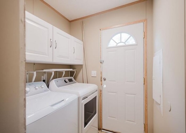 laundry room with cabinets and independent washer and dryer