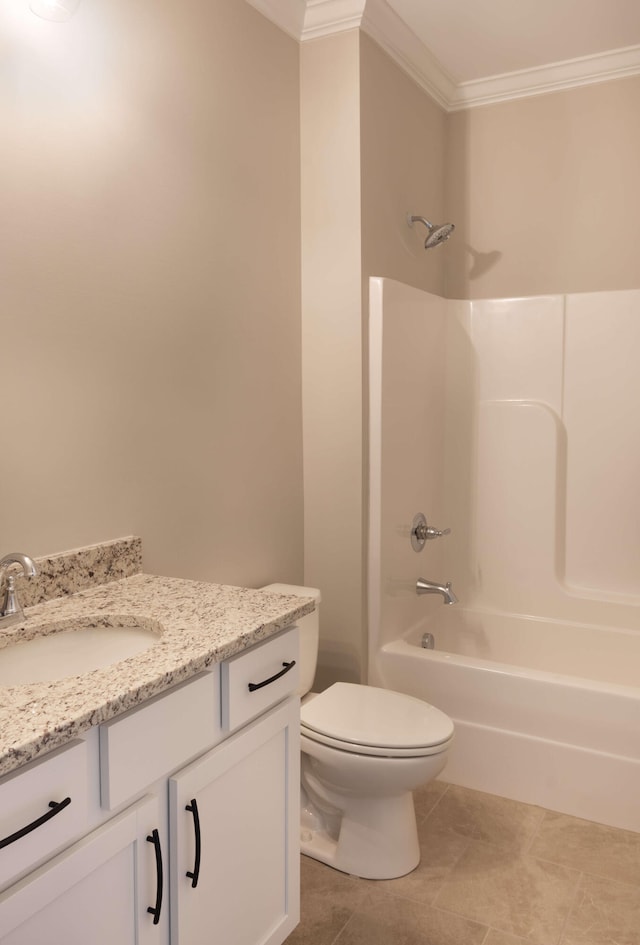 full bathroom featuring vanity, toilet, crown molding, tub / shower combination, and tile patterned floors