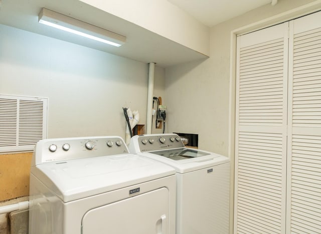 laundry room featuring independent washer and dryer