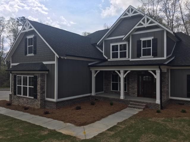 craftsman-style house featuring covered porch