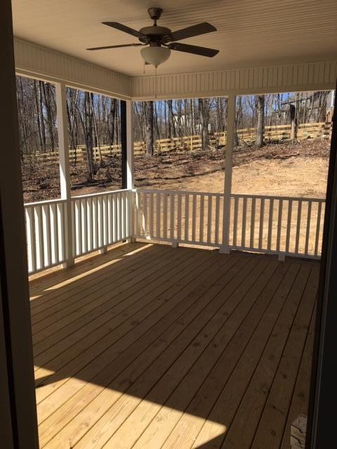 wooden terrace with ceiling fan