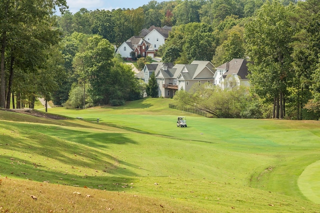 surrounding community featuring a lawn