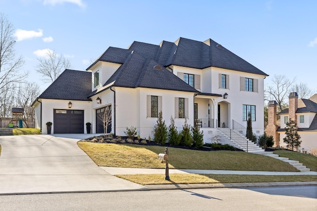 french provincial home featuring a front lawn