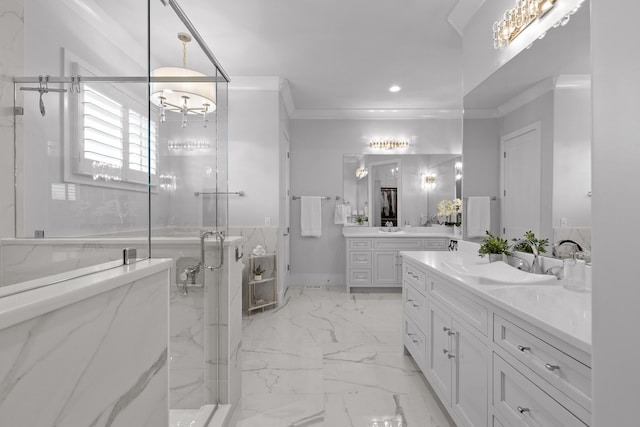 bathroom featuring crown molding, vanity, and a shower with door