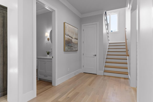 entryway with light hardwood / wood-style floors