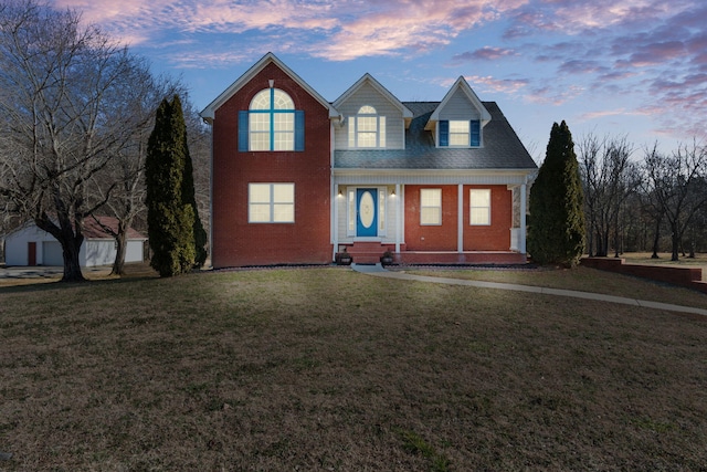 view of front property with a yard