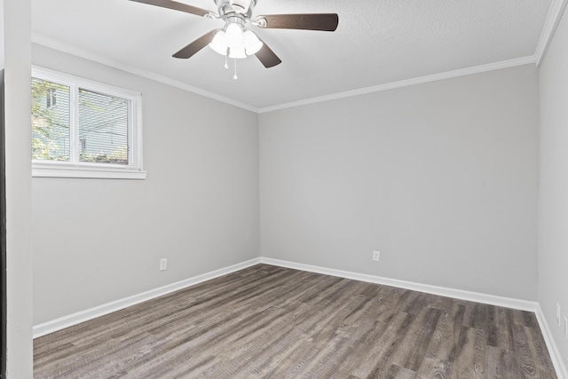 spare room with crown molding and ceiling fan