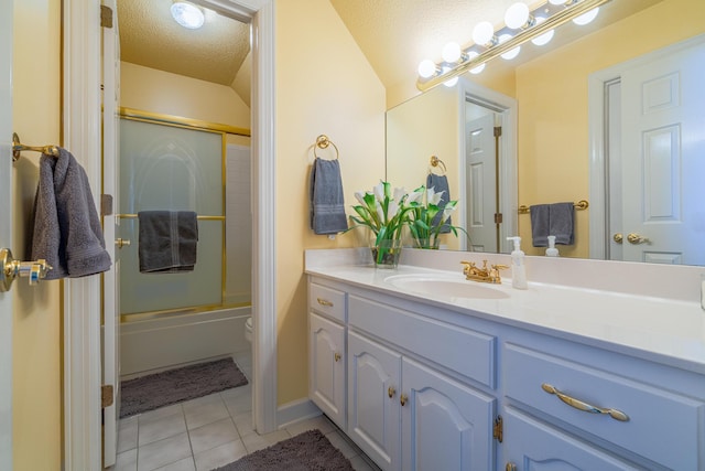 full bathroom with toilet, shower / bath combination with glass door, a textured ceiling, vanity, and tile patterned flooring