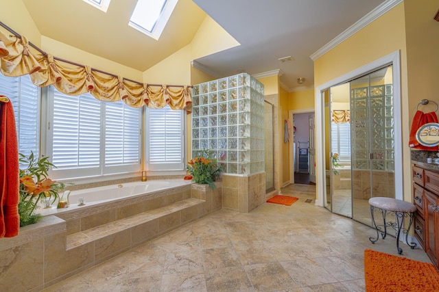 bathroom featuring crown molding, lofted ceiling with skylight, vanity, and plus walk in shower